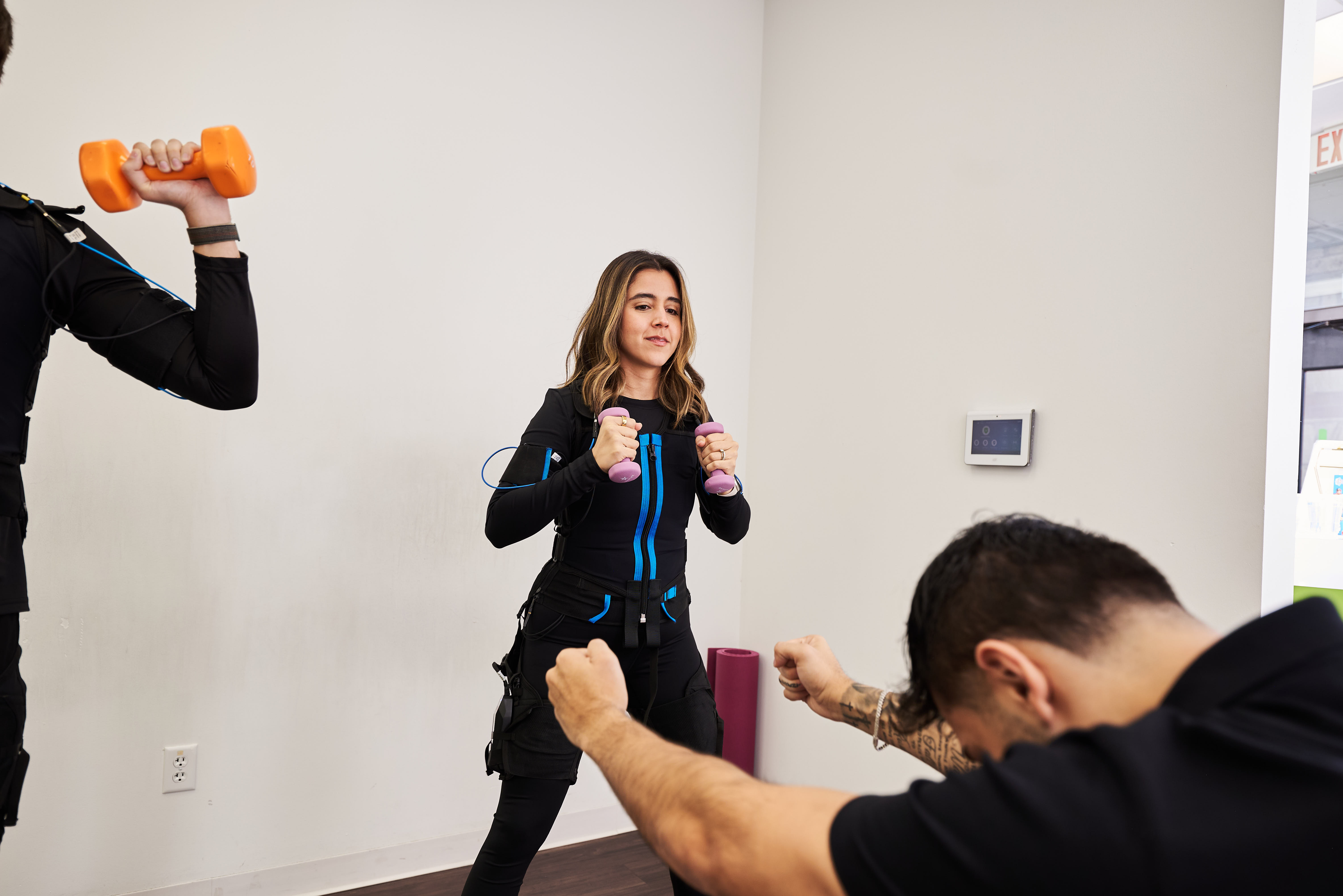 Athlete training in EMS suit